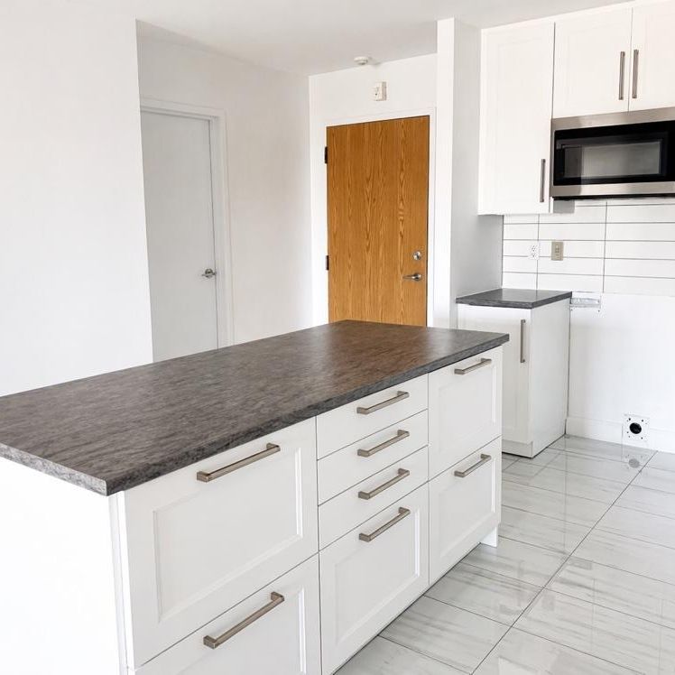 Condo 3½ avec vue fleuve + Château Frontenac | Stationnement intérieur | Lévis - Photo 1