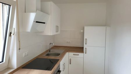 Renovierte 3 Zimmerwohnung mit schicker Einbauküche in zentraler Lage in Welschneudorf! - Photo 3