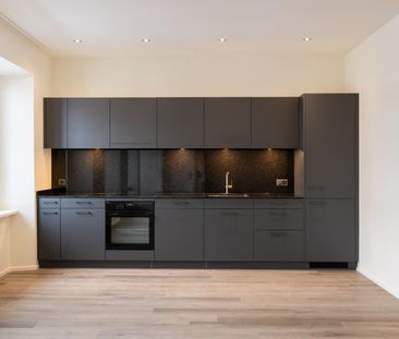 Moderne 2.5-Zimmer-Langzeit-Ferienwohnung im Dorfkern von Näfels - Foto 4