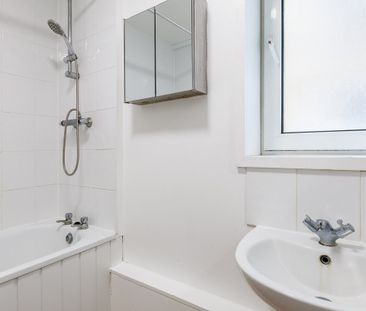 Spacious and bright second floor apartment within a well kept purpo... - Photo 5