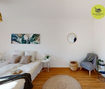 Lichtdurchflutete 2-Zimmer-Wohnung mit großer Dachterrasse! - Foto 6