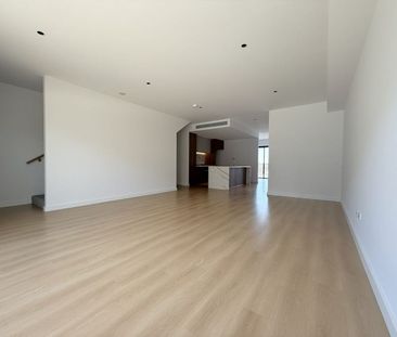 Spacious Three-Level Townhouse with Workshop & Dual Outdoor Living - Photo 2