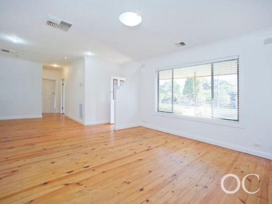 Open the Door to Easy Living with a Big Backyard in Tranmere - Photo 1
