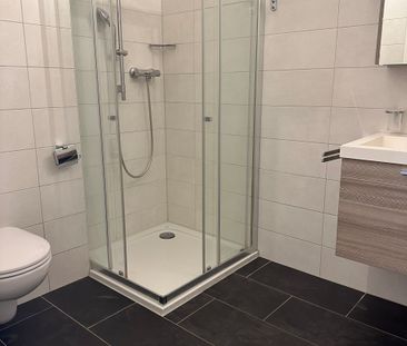 Discret appartement de 2.5 pièces en plein centre ville - Photo 4