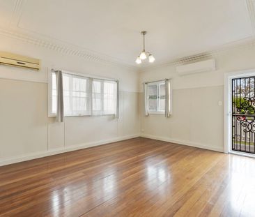 Freshly Painted Family Home with Spacious Yard & Deck - Photo 1