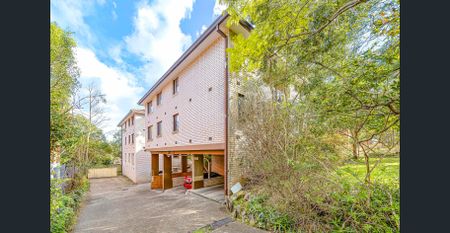 Updated Double Brick 2 Bedroom Unit in Prime Location - Photo 3