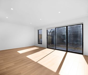 Stylish New Townhouse with Space, Comfort & Convenience - Photo 1