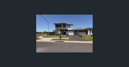 Contemporary 4-Bedroom Home in Prime Gregory Hills Location - Photo 4