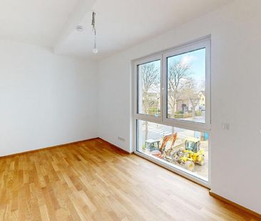 Neubau! Top-moderne 3-Zimmer-Wohnung im 2.OG mit hochwertiger Ausst... - Photo 4