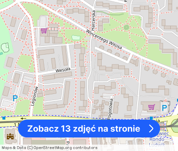 Niski blok przy ul. Harcerskiej w pobliżu parku - Zdjęcie 1