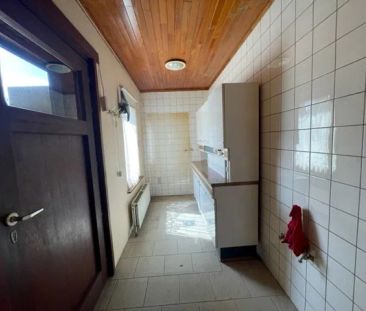 Gelijkvloers appartement met 2 slaapkamers en ruime tuin! - Photo 1