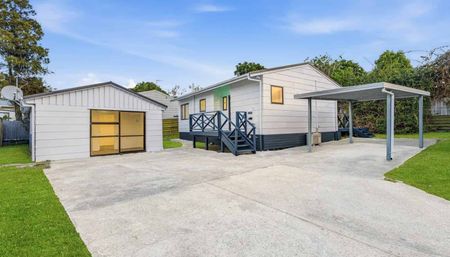 Sunny 2-Bedroom Home with Secure Parking & Extra Space - Photo 3