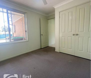 LOW MAINTENANCE LIVING WITH SPACIOUS BACKYARD - Photo 5