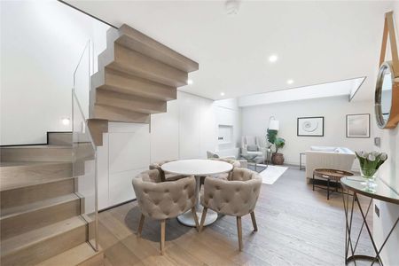 Beautifully finished and immaculate throughout, a split level one bedroom apartment with wooden floors ideally located moments from the Fulham Road. - Photo 4