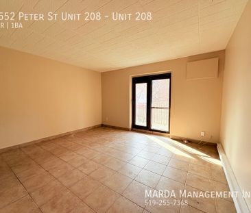 SPACIOUS 1-BEDROOM/1-BATH SUITE WITH UTILITIES INCLUDED! - Photo 3