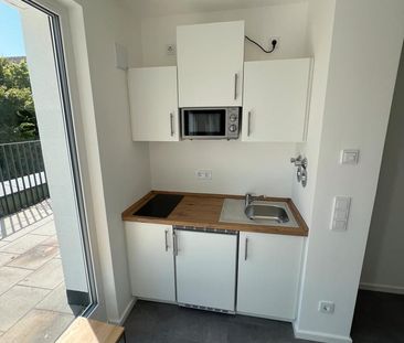 Sonne, Stil & Neubau: 1,5-Zimmer-Wohnung mit Dachterrasse - Foto 4