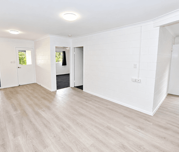 Spacious Townhouse with Modern Comforts - Photo 1
