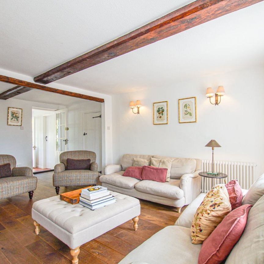This quintessential country cottage, offering a harmonious blend of period charm and contemporary elegance, is available for a long let in the picturesque village of West Stoke - Photo 1