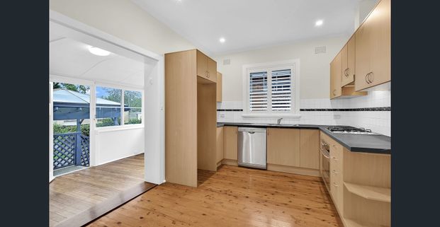 RENOVATED SEMI IN PRIME LOCATION - Photo 1