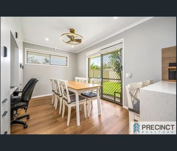 Modern 5-Bedroom Family Home with Solar, Security & Entertaining Space - Photo 3