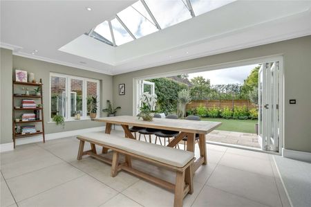 A superb seven bedroom family home situated in a popular residential road just 0.7 of a mile from Oxshott station. - Photo 2