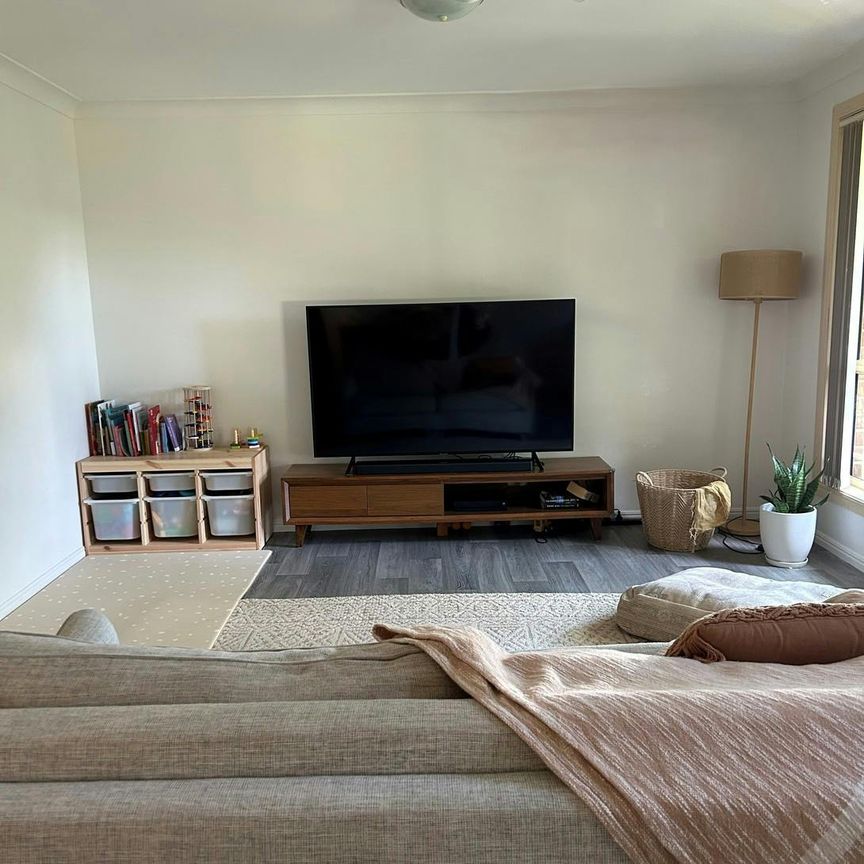 Easy Family Living with Large Backyard - Photo 1