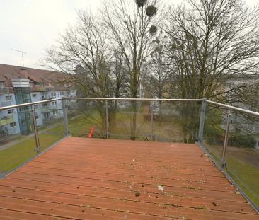 Exklusive Dachgeschosswohnung mit großer Terrasse – Ruheoase im Her... - Foto 2