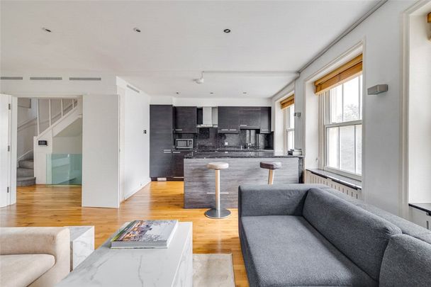 A spacious three double bedroom duplex apartment on one of Knightsbridge`s premier garden squares. The bright redecorated property is laid out over the top two floors (3rd & 4th) and has been refurbished to a high standard. EPC rating D | Council Tax Band H - Photo 1