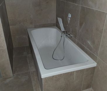 Moderne 3-Zimmer-Wohnung mit zwei Dachterrassen in Langendamm zu ve... - Photo 4