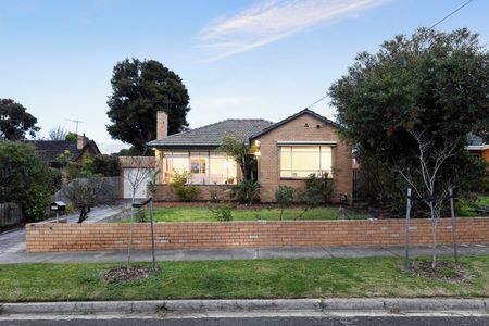 Neat & Tidy 3 Bedroom Home On a "Beach-Side of the Highway" Position! - Photo 3