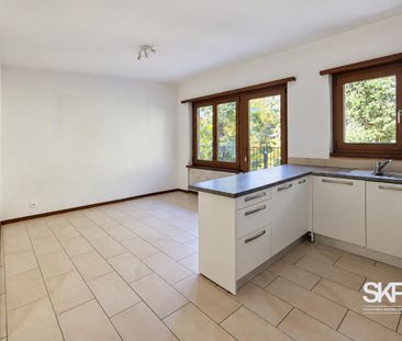 BREGANZONA - AFFITTASI APPARTAMENTO 2.5 LOCALI CON BALCONE SUL VERDE - Photo 2