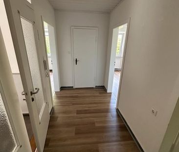 Charmante 3 Zimmer Wohnung mit Garten und Garage - Foto 1
