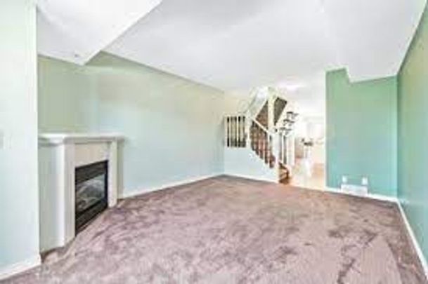 Move-In Ready 2-Bedroom Townhouse in the Heart of Downtown Okotoks - Photo 1