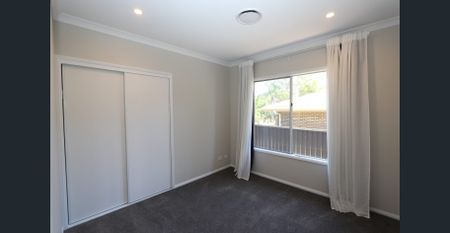 Gorgeous Family Home within Benowa State High School Catchment - Photo 2