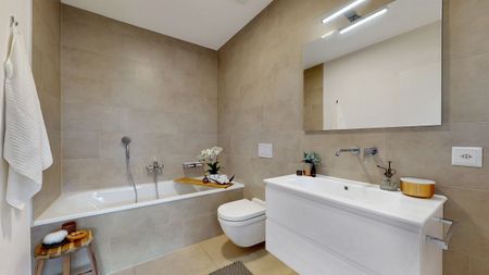 Ultimo piano con stile: moderno 3.5 locali nella residenza Parco Cornaredo - Foto 2