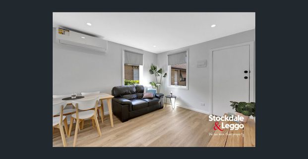 Modern Comfort in a Prime Location! - Photo 1