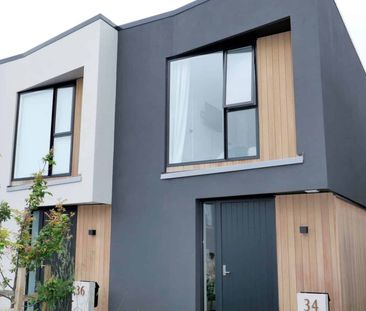 Stylish and Sun-Filled Two-Bedroom Townhouse - Photo 3