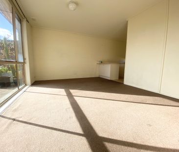 Charming 2-Bedroom Unit in Prime Location - Photo 1