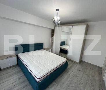 Apartament decomandat, cu 2 camere, 55 mp, balcon, parcare, zona-Rovine - Photo 2