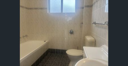 Expansive Top Floor Living With Lock-up Garage - Photo 5