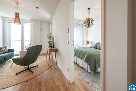 2-Zi.-Erstbezug mit Rooftop Wellness & Donaublick | TOWER HOMES - Photo 2