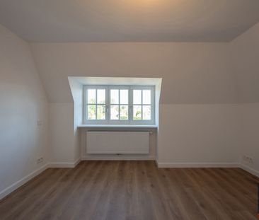 Gerenoveerde, ongemeubelde koppelvilla met zuidgerichte tuin palend... - Photo 3