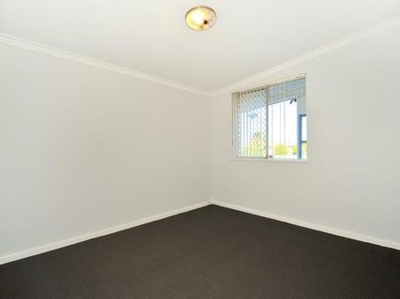 Coastal Comfort & Convenience - Charming Home in Prime Rockingham Location - Photo 2