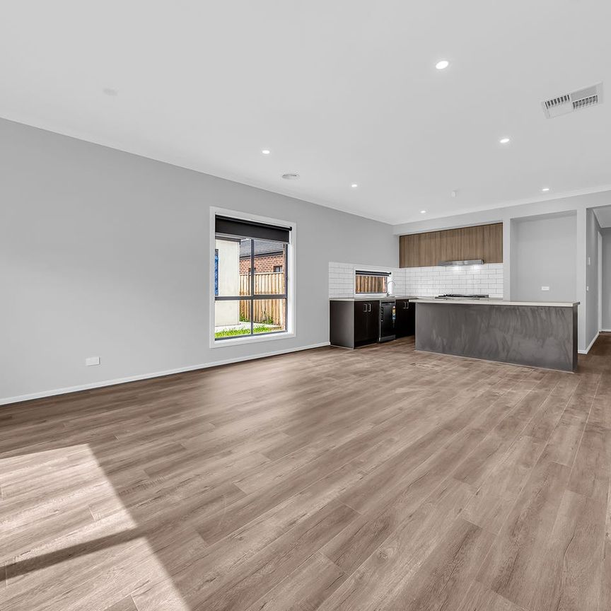 Modern 4-Bedroom Family Home in Prime Tarneit Place Estate Location - Photo 1