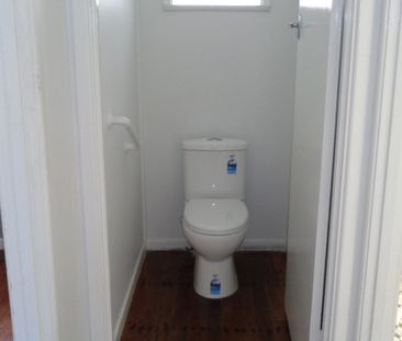 CONVENIENTLY LOCATED FAMILY HOME WITH 2 STREET ACCESS - Photo 6