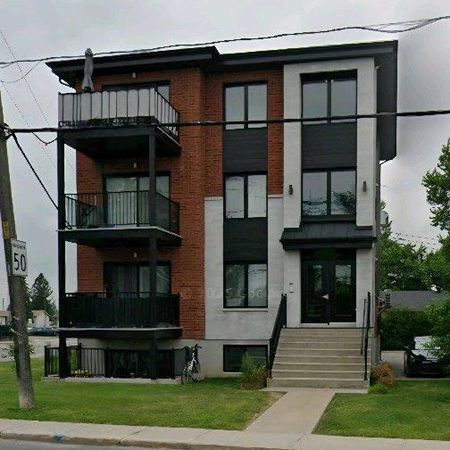 Grand 4 1/2 moderne et lumineux - Photo 4