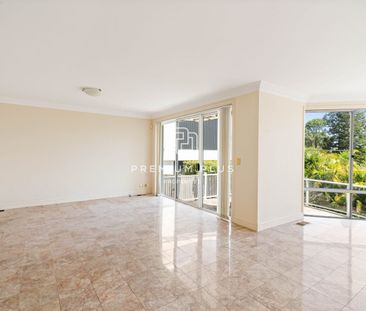 Elevated Family Home with Expansive Living & Leafy Outlook - Photo 2