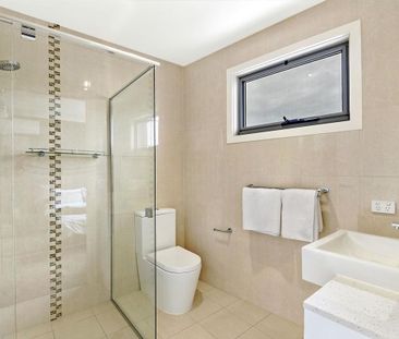 Sophisticated Three-Level Townhouse in a Sought-After Pocket - Photo 2