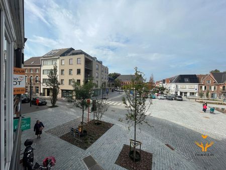 Knap appartement met 2 slaapkamers op de Markt - Photo 3