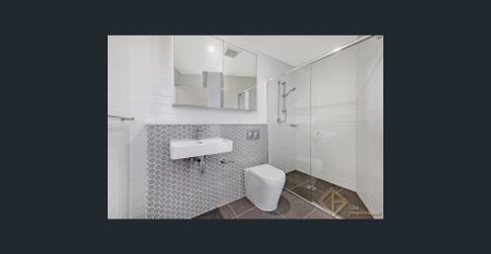 Modern High-Level Apartment with District Views | Walk to Light Rail - Photo 2